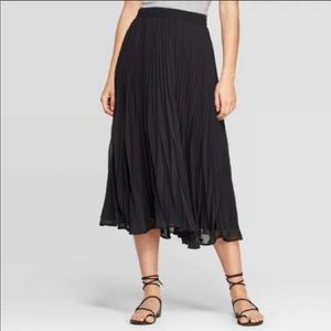 Pleated black midi skirt